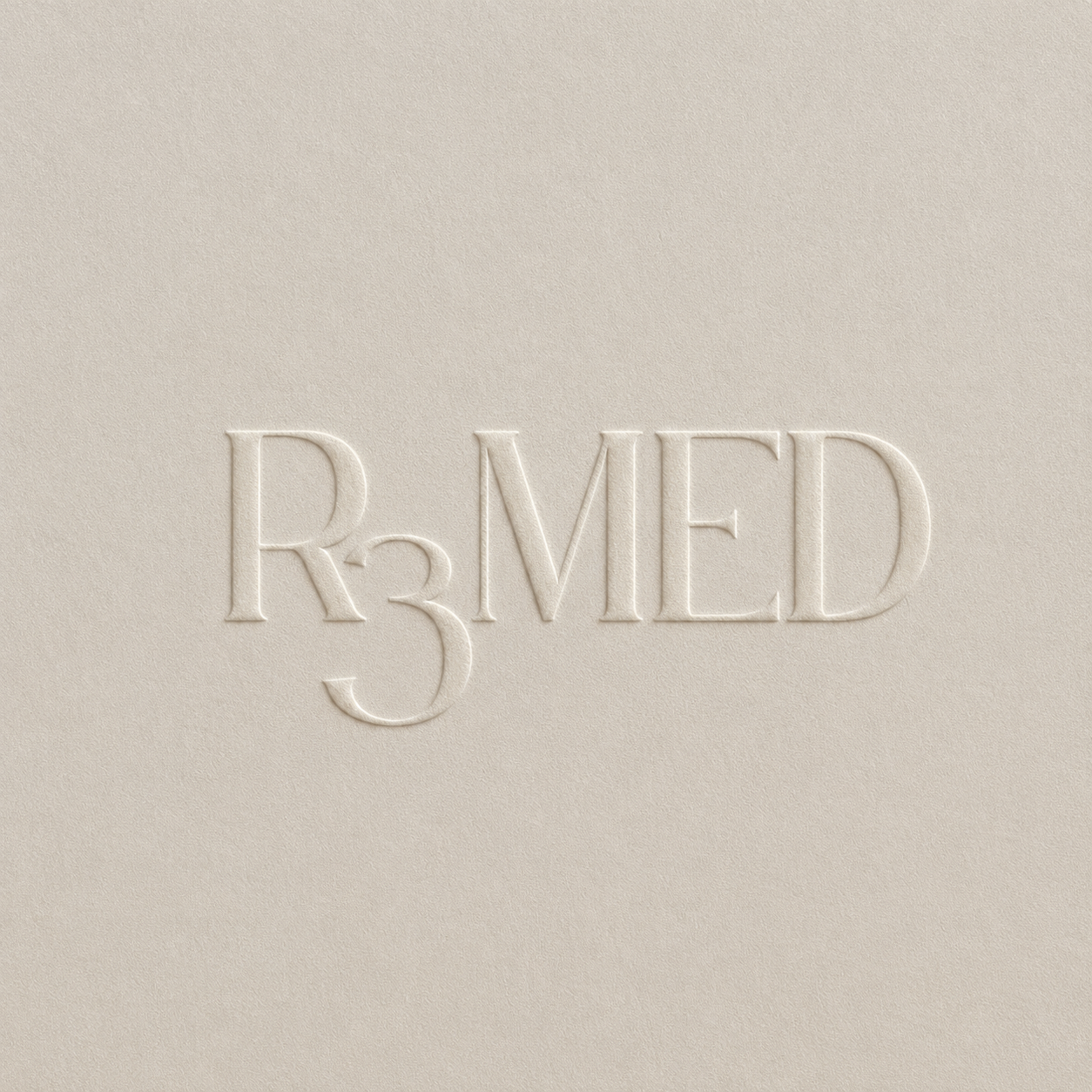R3Med blind-embossed logo on premium cream paper